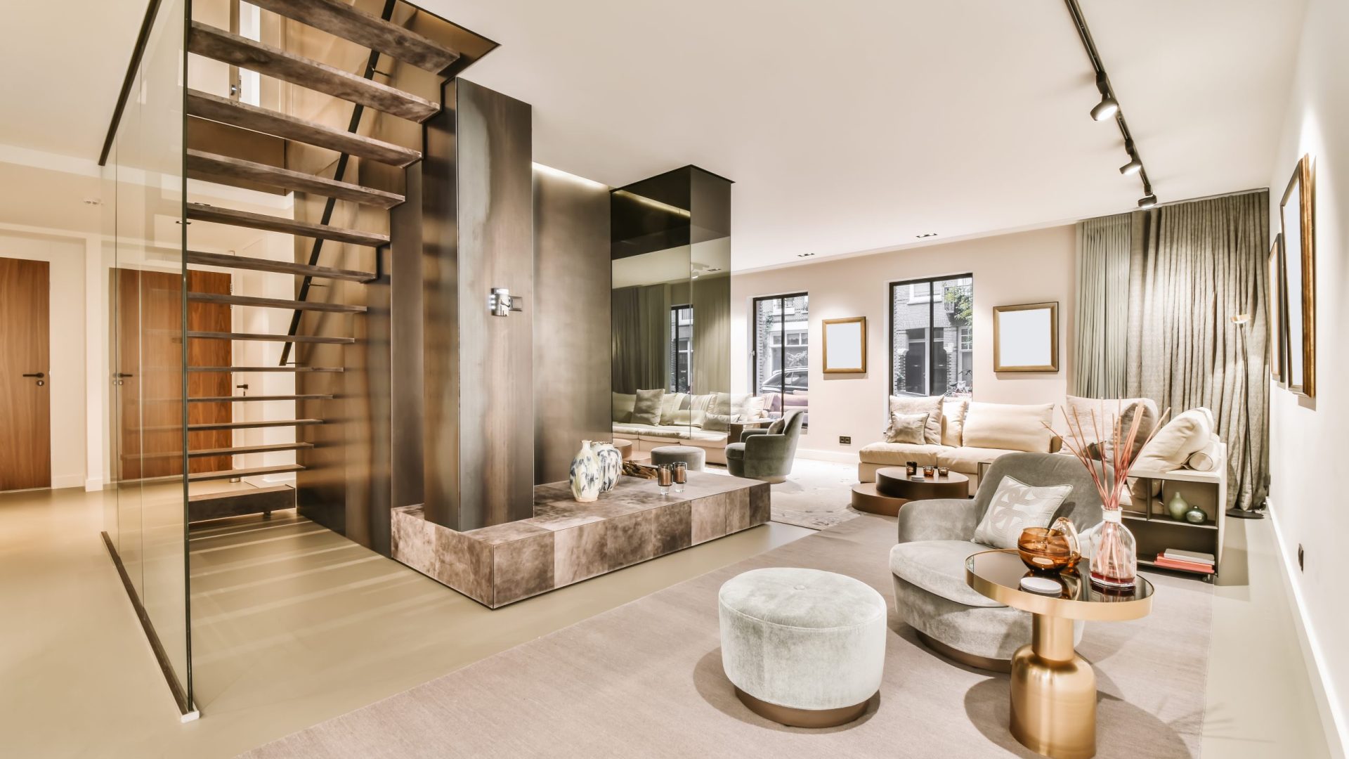 Attractive living room with beige sofa and lots of decorative souvenirs