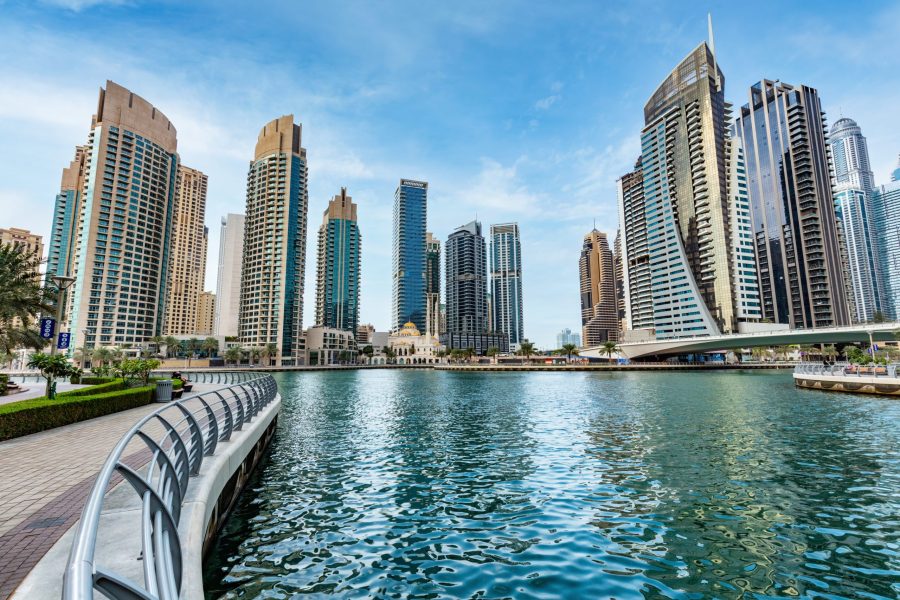 Dubai marina skyline in UAE. High-rise residential buildings, business skyscrapers