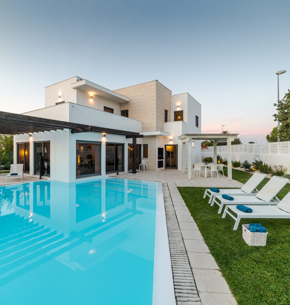 Modern house with garden swimming pool and wooden pergula